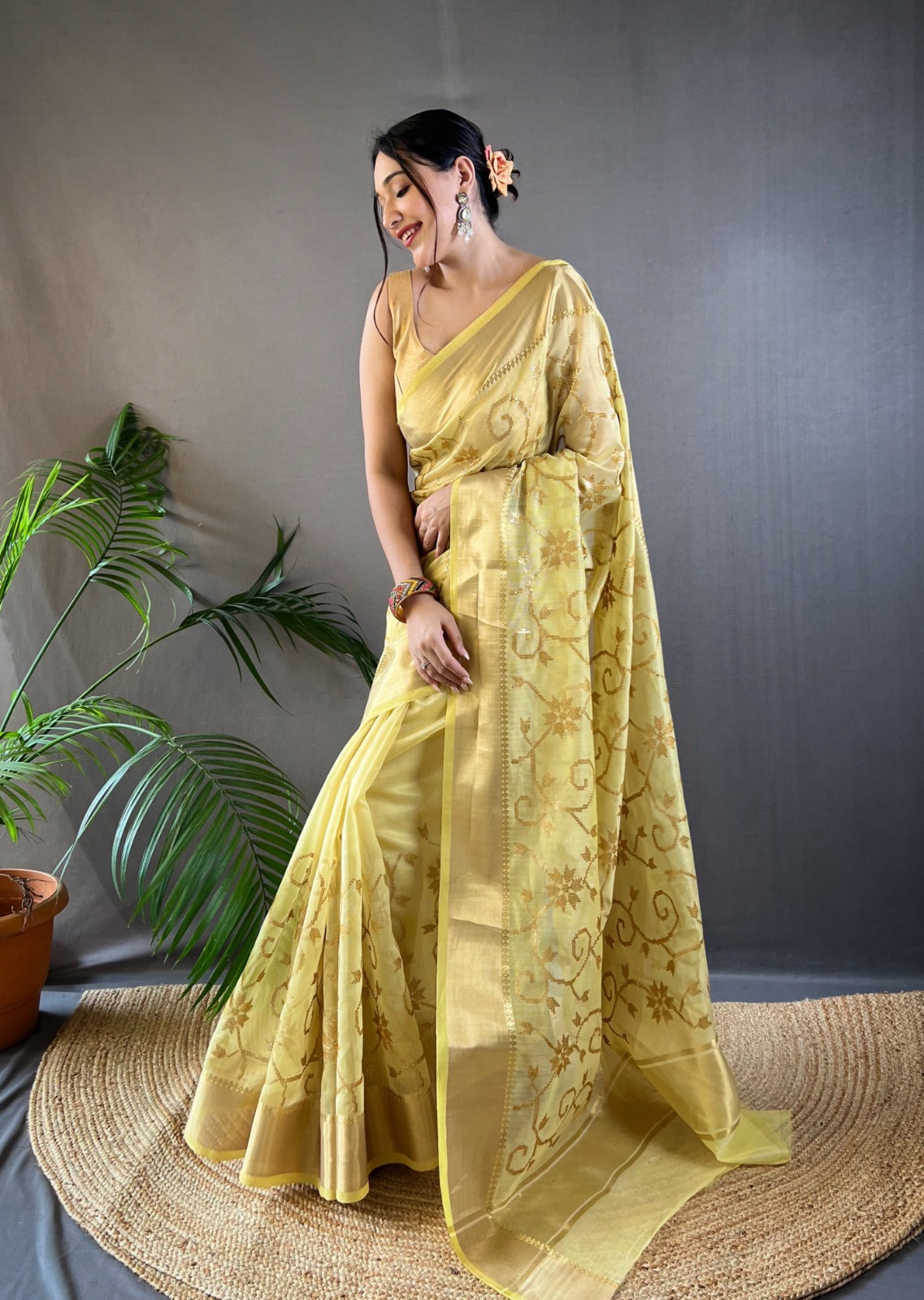 Soft Tissue Saree With Golden Weaving Border and Sequence Embroidery