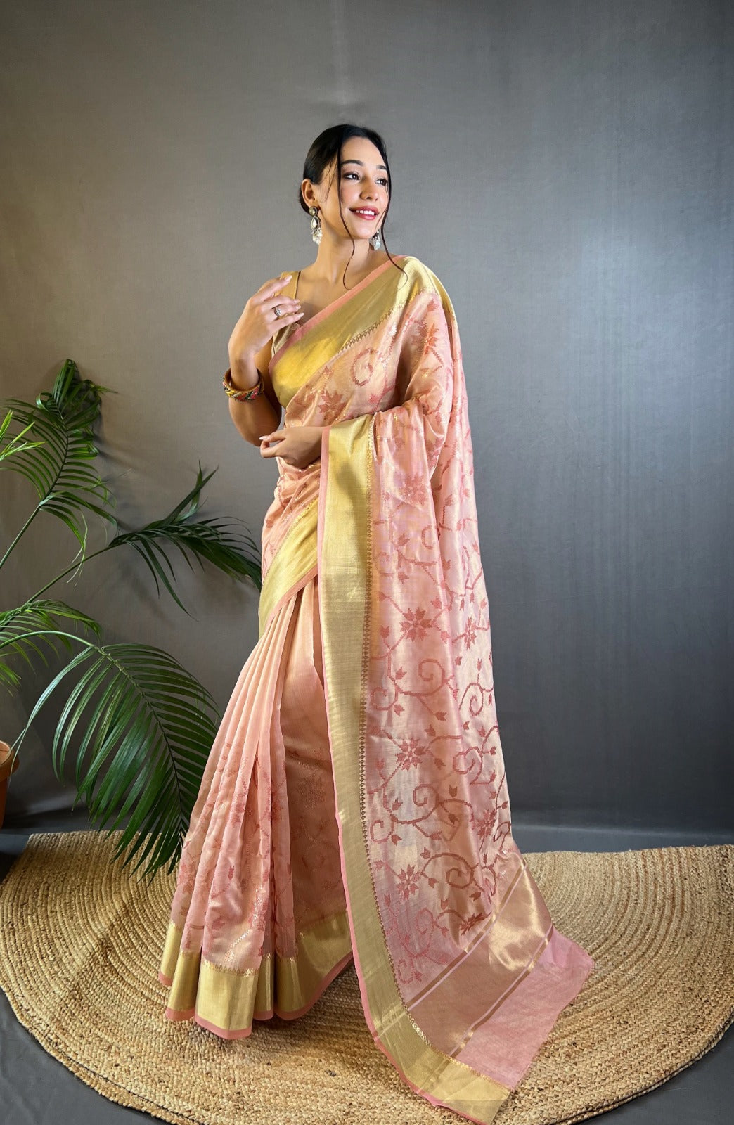 Soft Tissue Saree With Golden Weaving Border and Sequence Embroidery