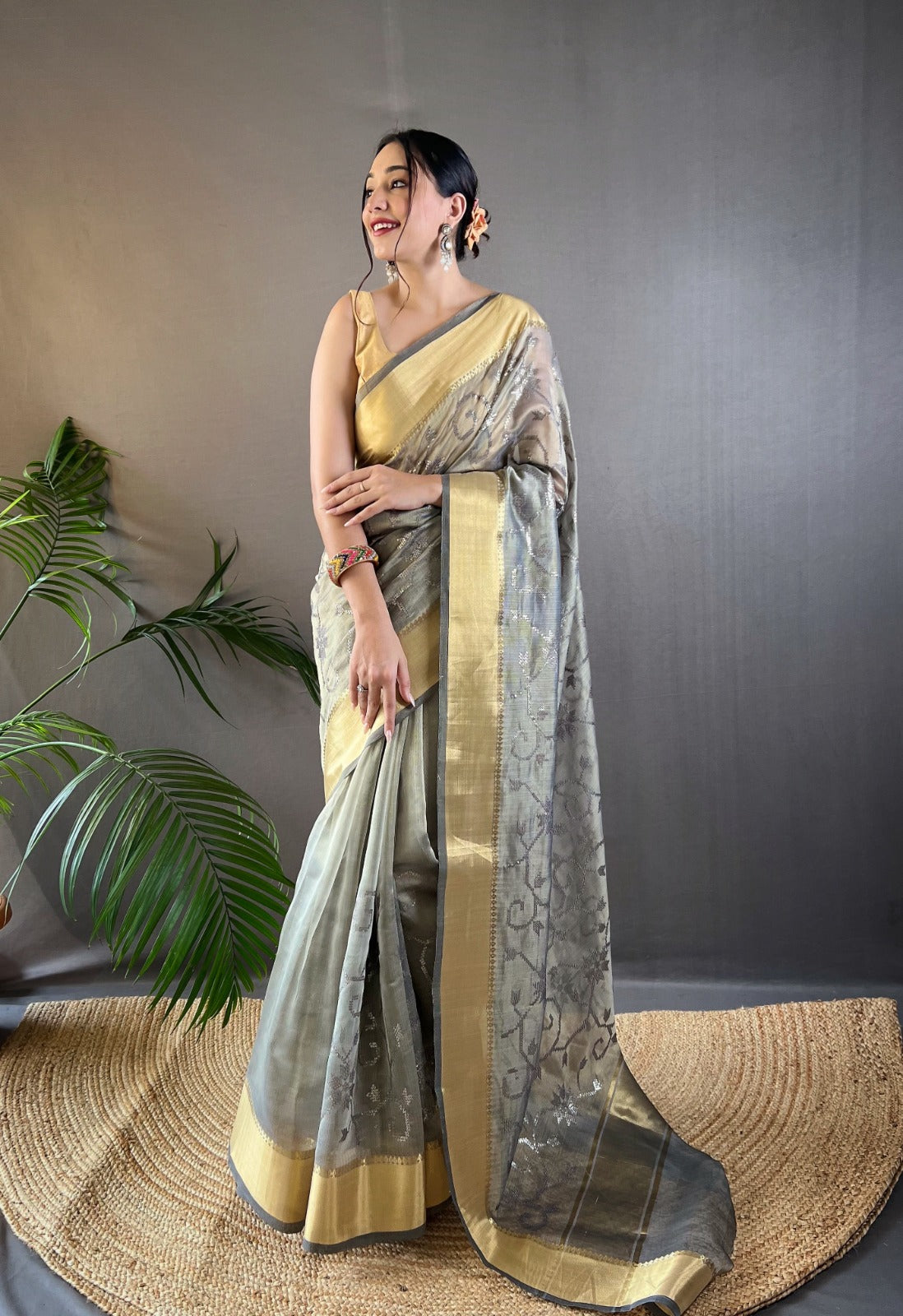 Soft Tissue Saree With Golden Weaving Border and Sequence Embroidery