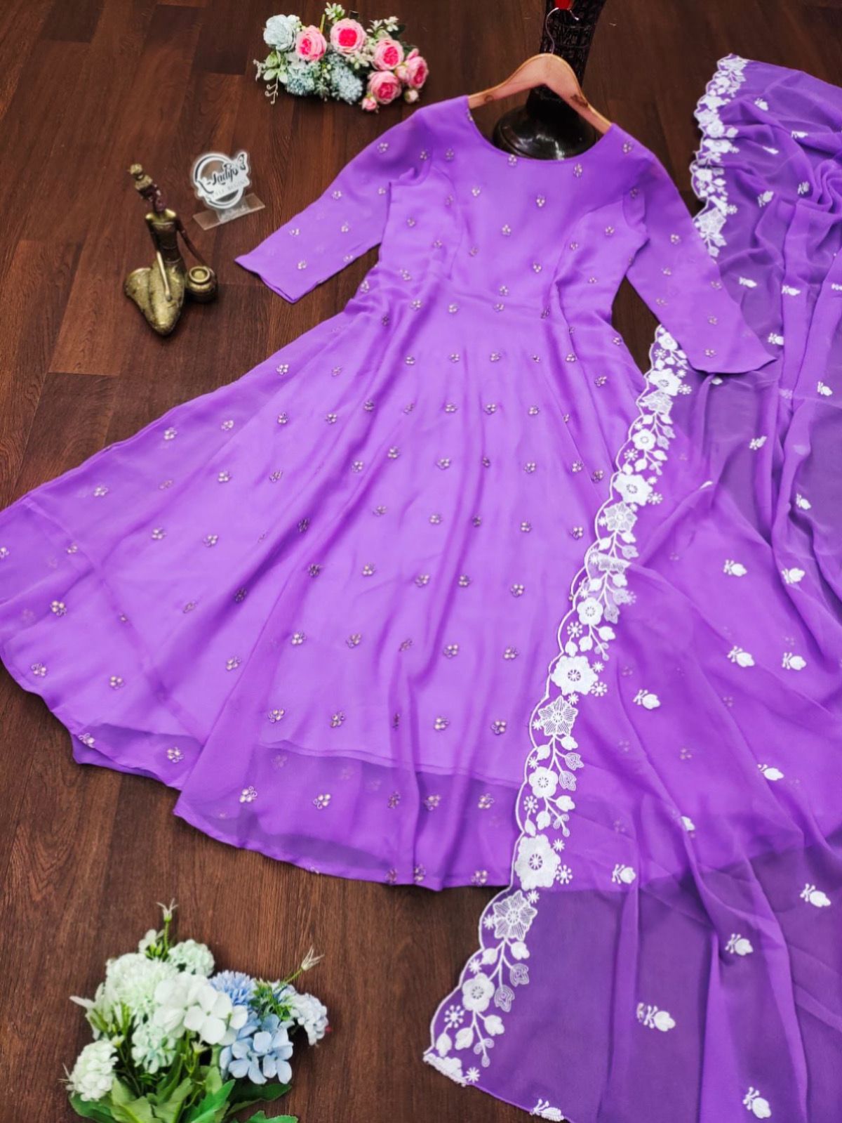 Light Violet Anarkali Georgette Gown With Embroidered Butties