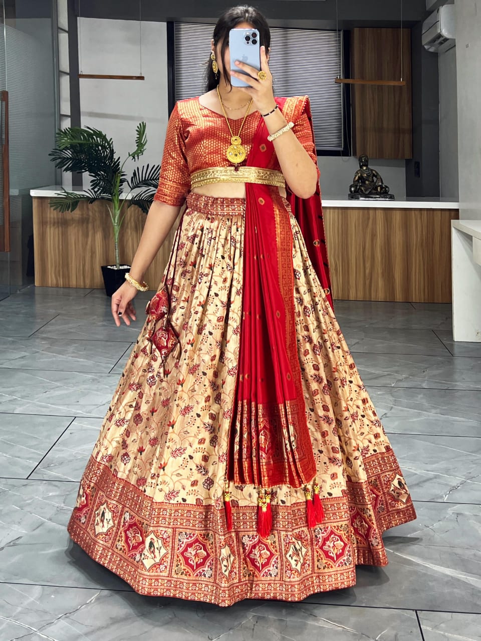 SHYAMAL & BHUMIKA US - Dayana wears a bias cut tango red lehenga with a  spray of floral embroidery all teamed with a champagne gold blouse The  blouse is completely done in